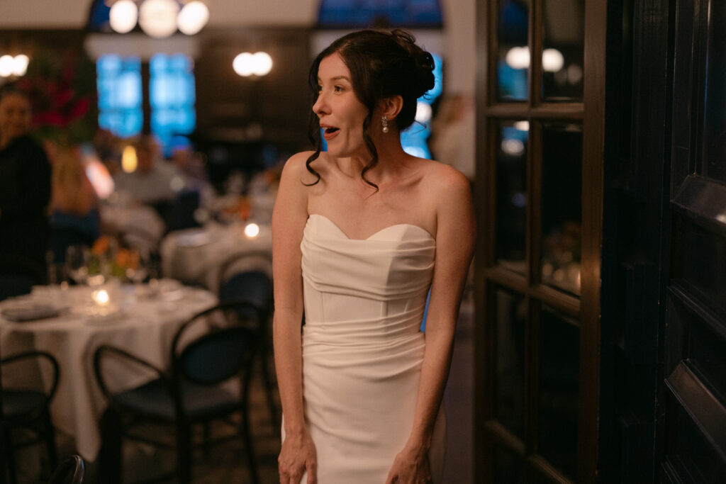 bride in awe of wedding reception upon first sight