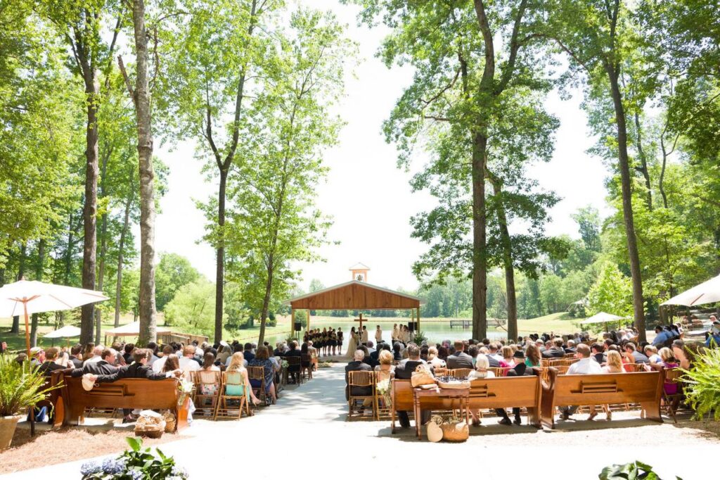Outdoor wedding ceremony at Historic Hopkins Farm wedding venue Simpsonville, SC